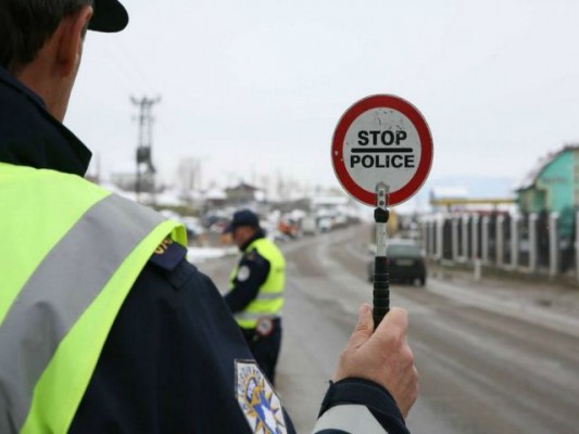 Kosovo.police.stop.sign