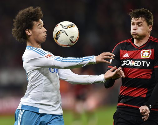 FILE - In this Sunday, Nov. 29, 2015 file photo, Schalke's Leroy Sane, left, and Leverkusen's Sebastian Boenisch, right, challenge for the ball during the German Bundesliga soccer match between Bayer 04 Leverkusen and FC Schalke 04 in Leverkusen, Germany. Many nations are betting on youth at the European Championship, giving promising youngsters a chance to breakthrough in France. Some of the top nations have included up-and-coming players in their squads for this months tournament, with some giving up experience to make way for young talent. (AP Photo/Martin Meissner, File)